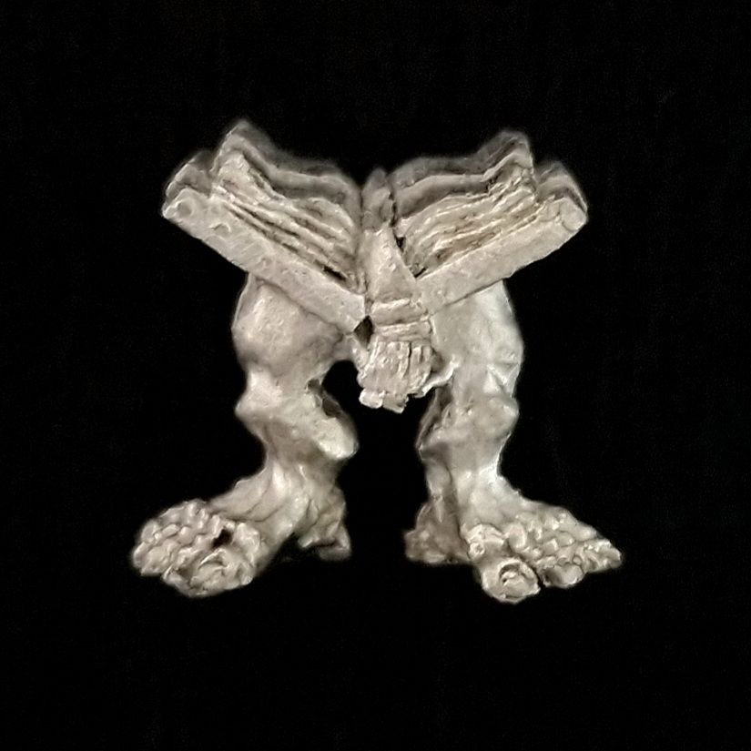 A photo of a Chaos Warriors Familiar Walking Book Warhammer miniature