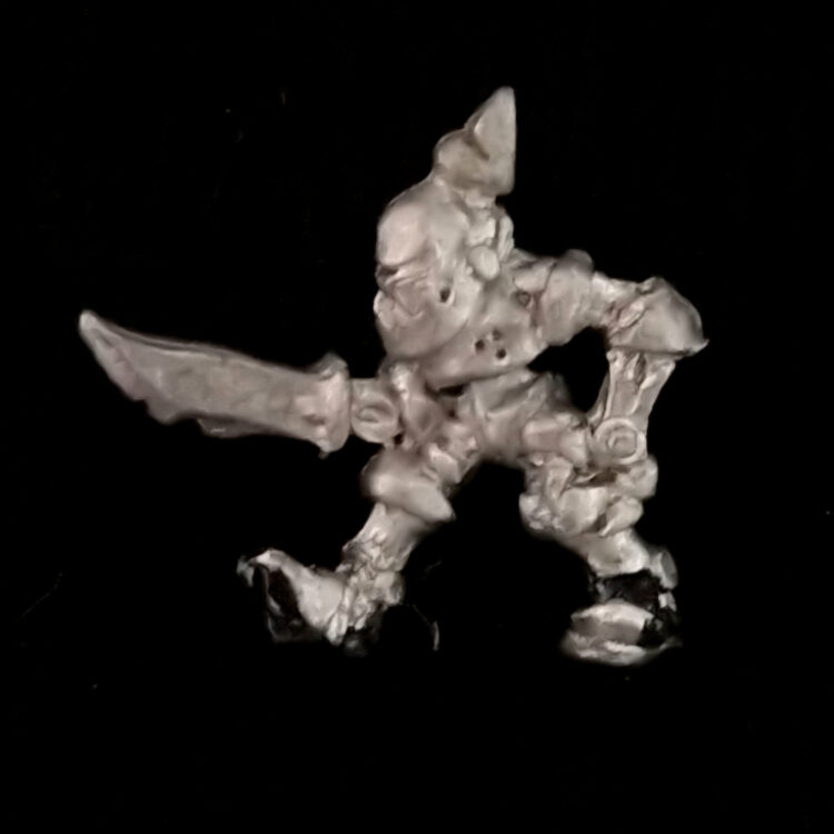 A photo of a Chaos Warriors Familiar Armoured Mite Warhammer miniature