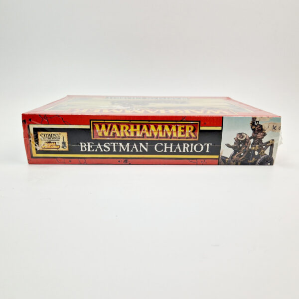 A photo of a Beasts of Chaos Beastman Chariot Warhammer miniature