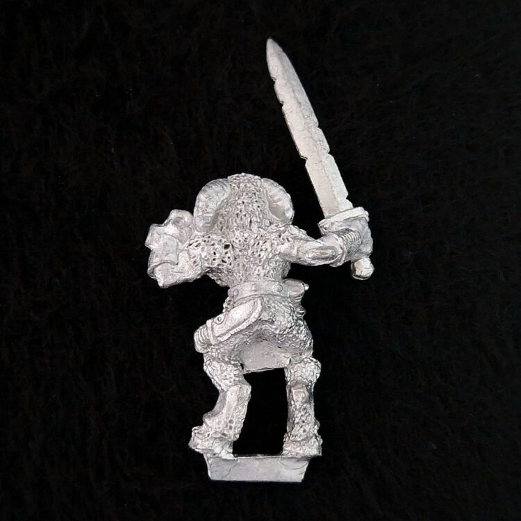 A photo of a Beasts of Chaos Marauder Beastman Warhammer miniature