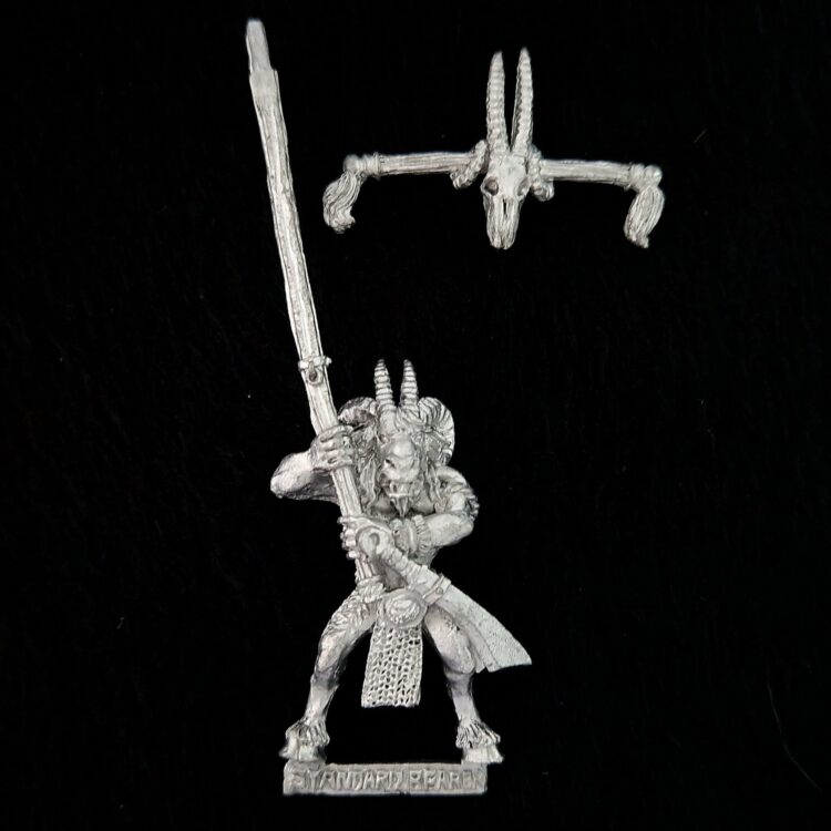 A photo of a Beasts of Chaos Beastmen Standard Bearer Warhammer miniature