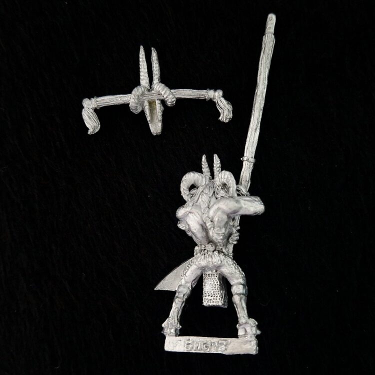 A photo of a Beasts of Chaos Beastmen Standard Bearer Warhammer miniature