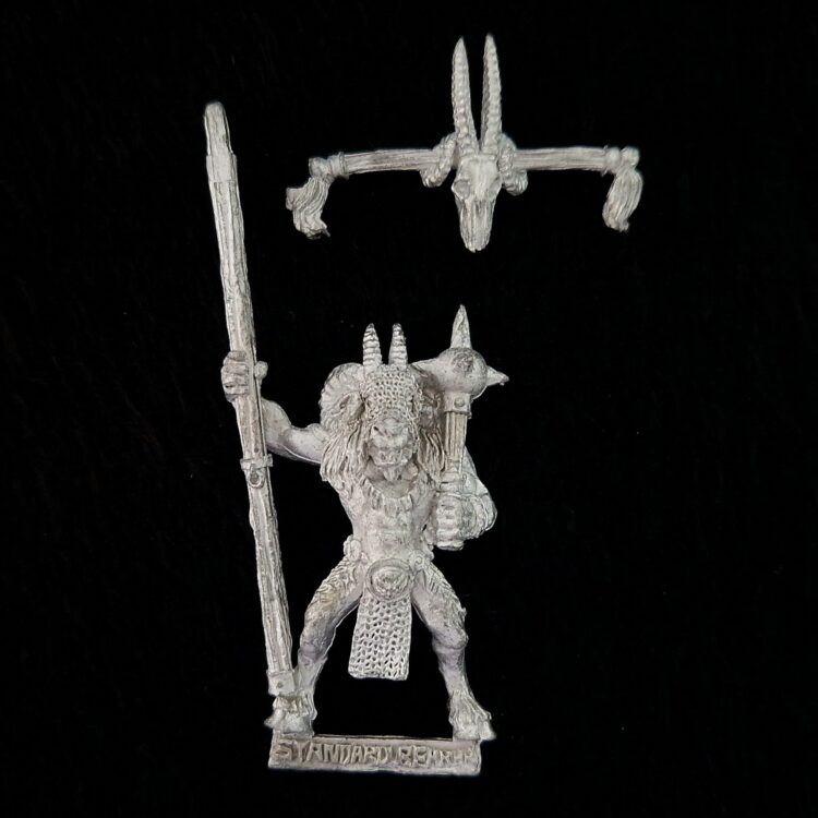 A photo of a Beasts of Chaos Beastmen Standard Bearer Warhammer miniature