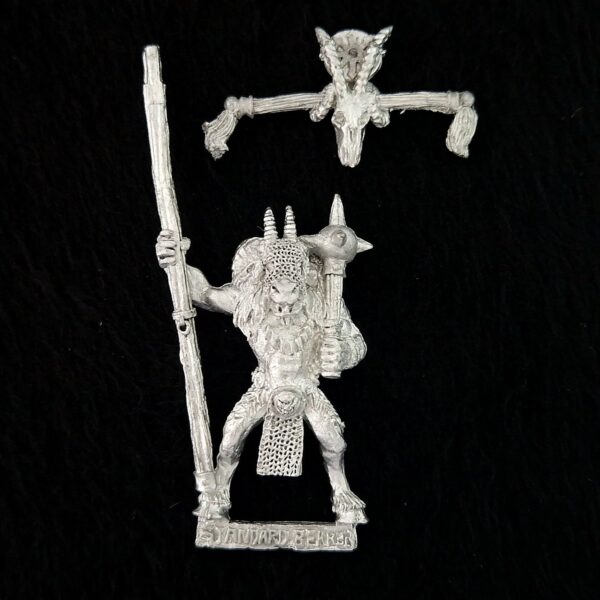 A photo of a Beasts of Chaos Beastmen Standard Bearer Warhammer miniature