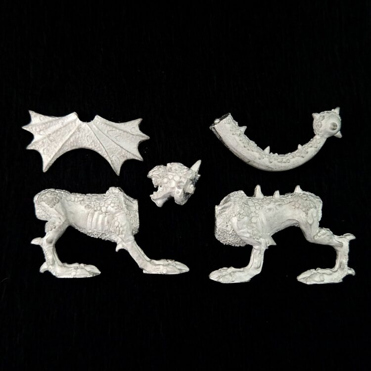 A photo of a Chaos Daemons Flesh Hound Warhammer miniature