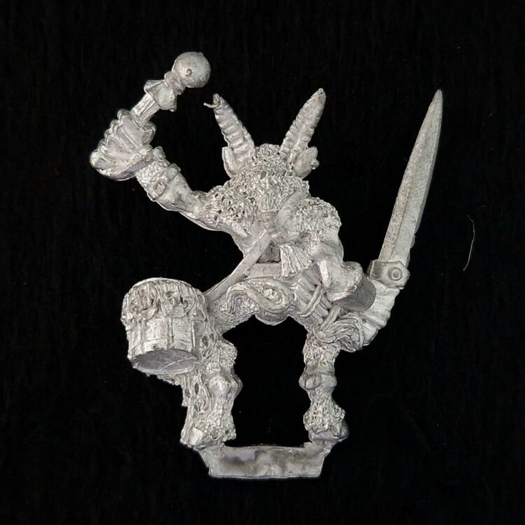 A photo of a Beasts of Chaos Marauder Beastmen Drummer Warhammer miniature