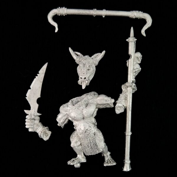 A photo of a Beasts of Chaos Minotaur Standard Bearer Warhammer miniature