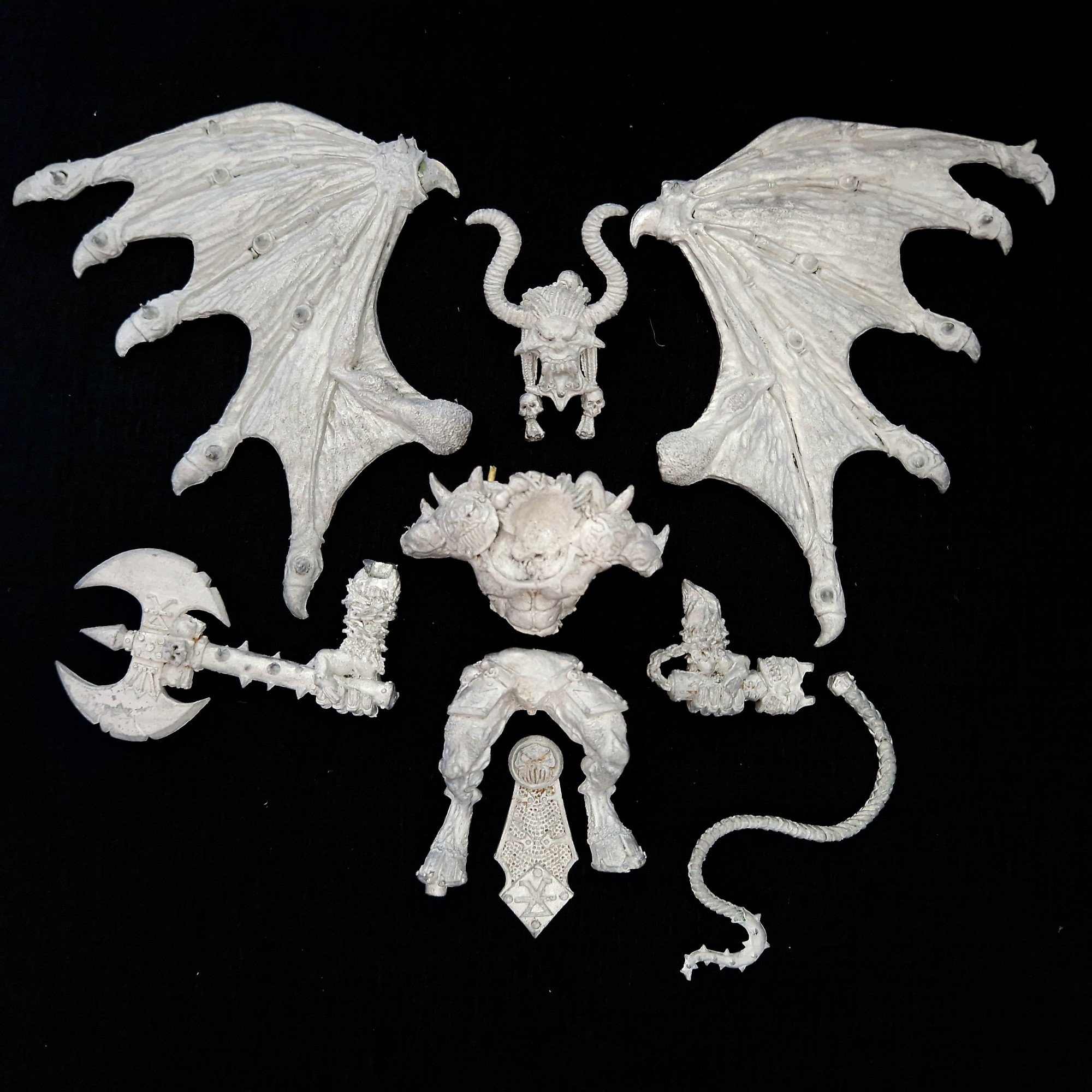 A photo of a Chaos Daemons Bloodthirster Greater Daemon of Khorne Warhammer miniature