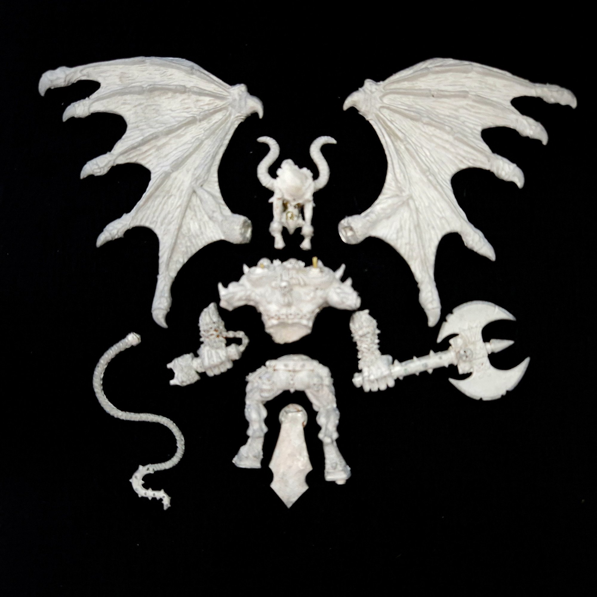 A photo of a Chaos Daemons Bloodthirster Greater Daemon of Khorne Warhammer miniature