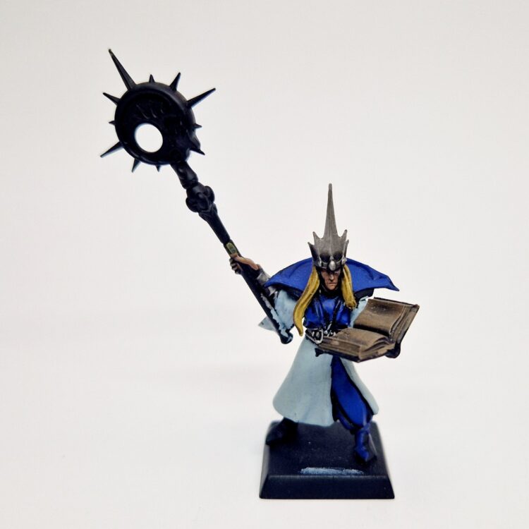 A photo of a High Elves Mage Warhammer miniature