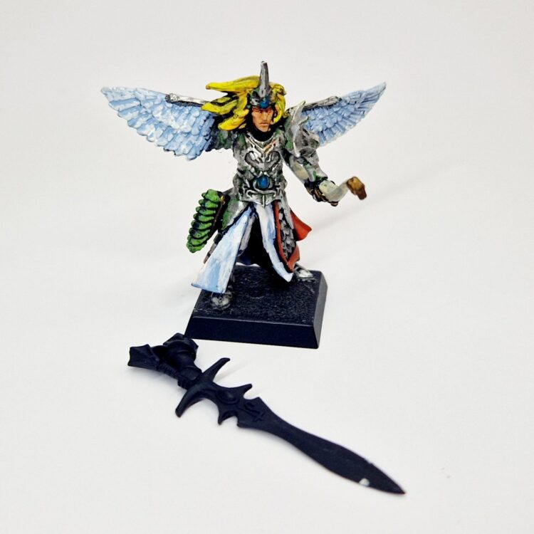 A photo of a High Elves Noble Warhammer miniature