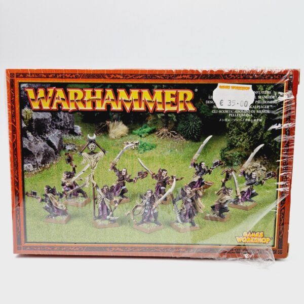 A photo of Dogs of War Mengil Manhide's Manflayers Warhammer miniatures