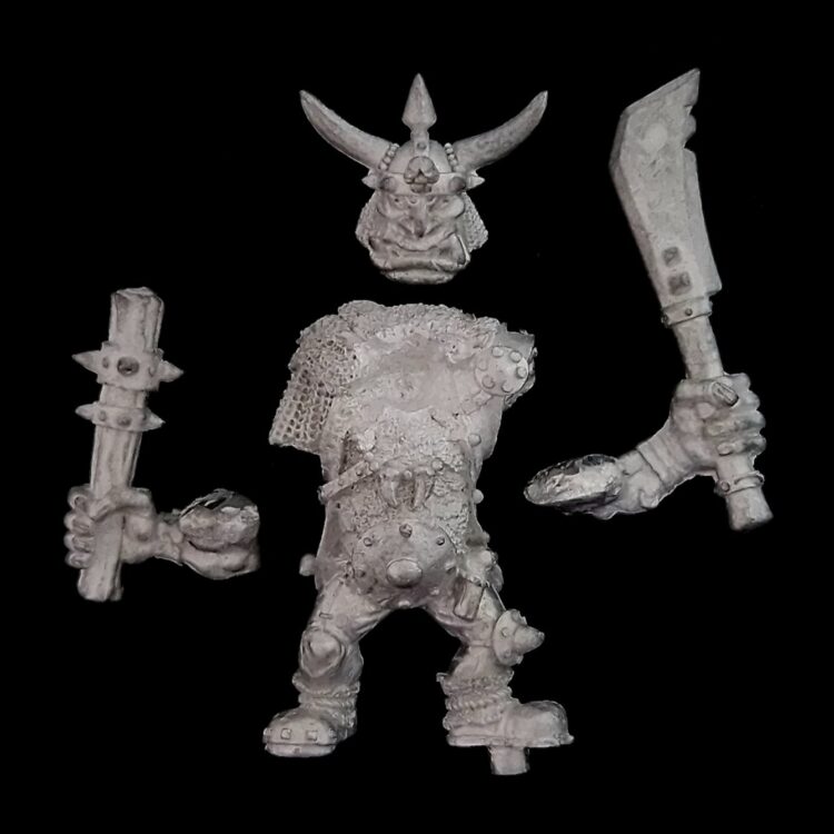 A photo of a Dogs of War Golgfag's Mercenary Ogres Golgfag Warhammer miniature