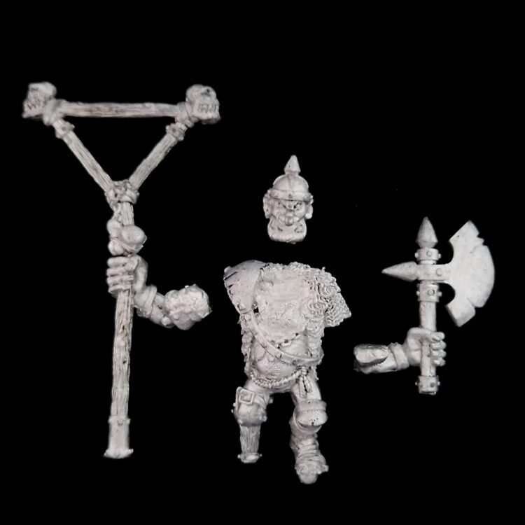 A photo of a Dogs of War Golgfag's Mercenary Ogres Standard Bearer Warhammer miniature