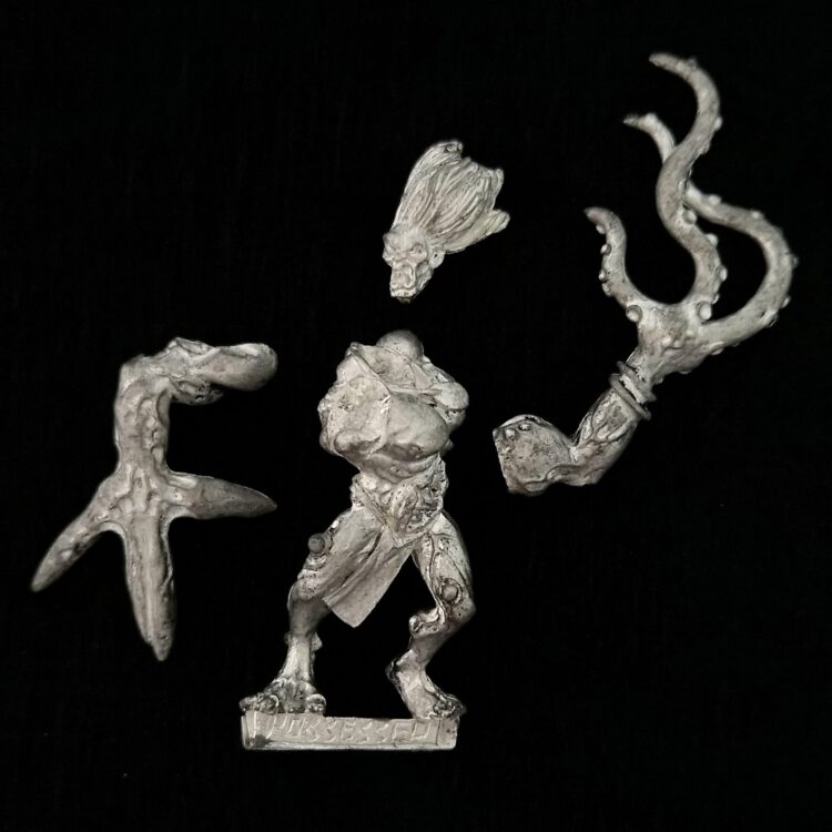 A photo of a Mordheim Cult of the Posessed Posessed Warhammer miniature