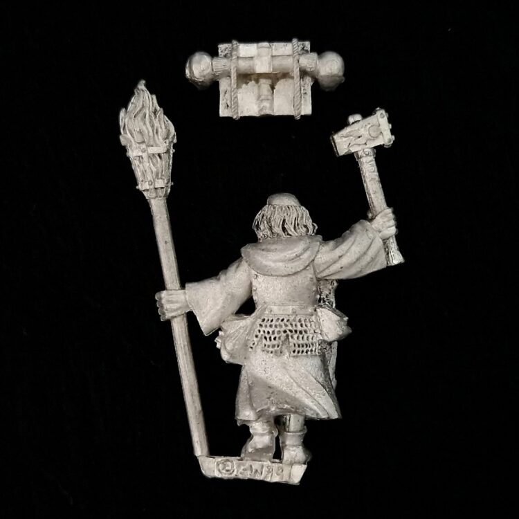 A photo of a Mordheim Witch Hunters Sigmarite Priest Warhammer miniature