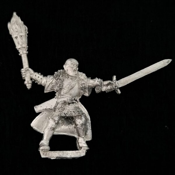 A photo of a Mordheim Witch Hunters Witch Hunter Warhammer miniature