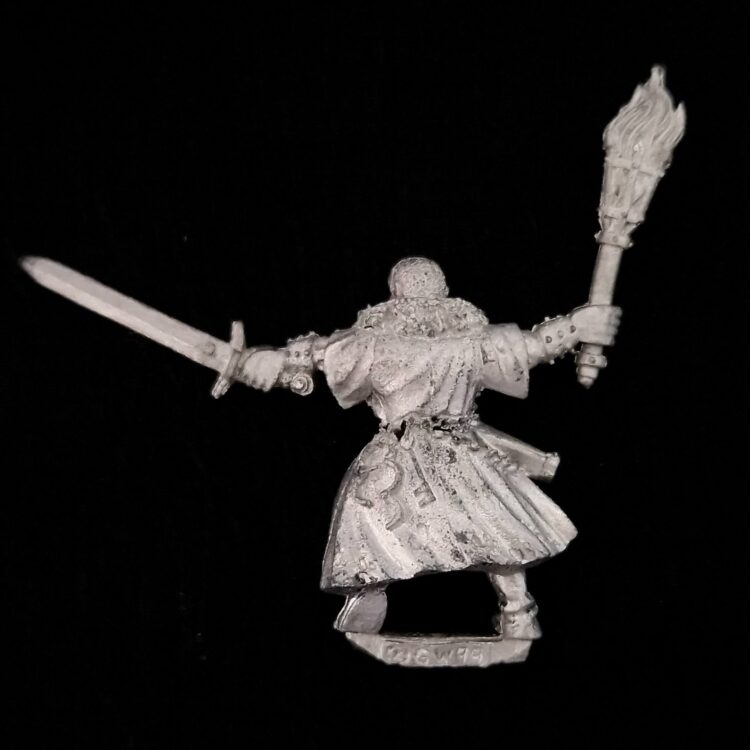 A photo of a Mordheim Witch Hunters Witch Hunter Warhammer miniature