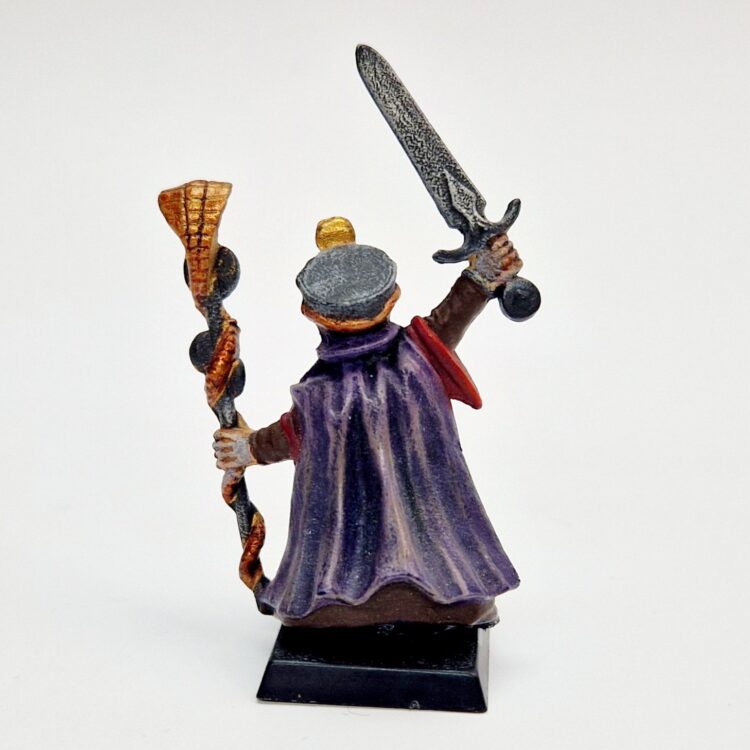 A photo of a Talisman High Priest Warhammer miniature