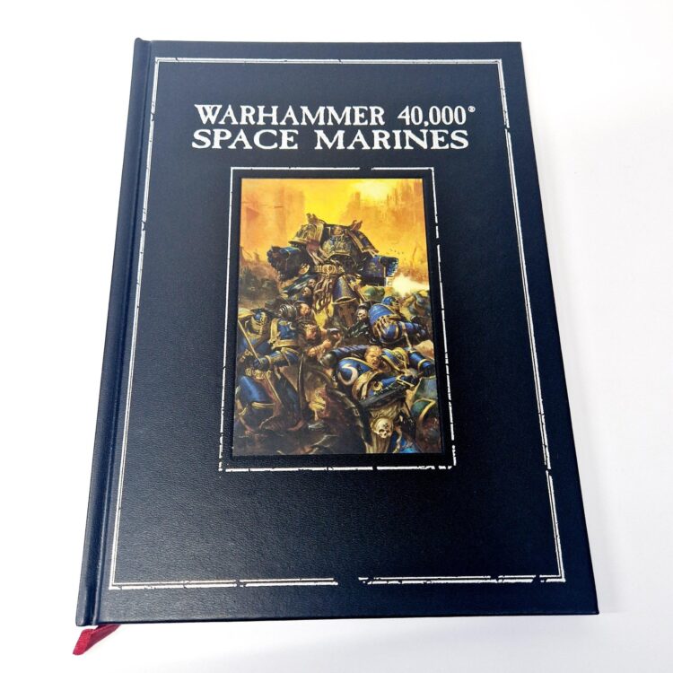 A photo of a Warhammer Limited 4th Edition Space Marines Codex Signed