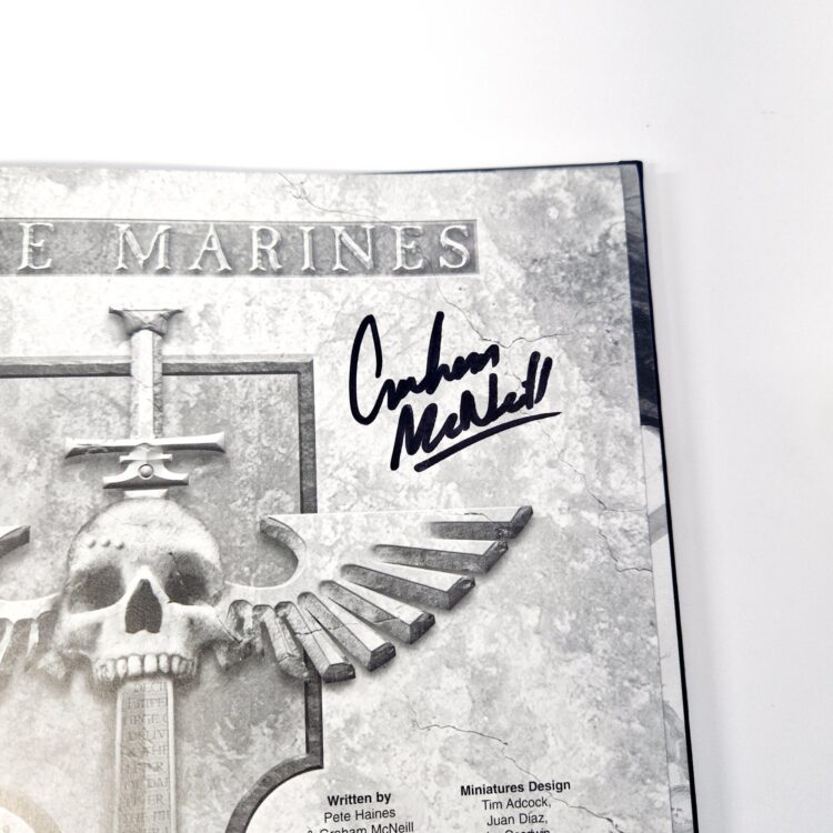 A photo of a Warhammer Limited 4th Edition Space Marines Codex Signed