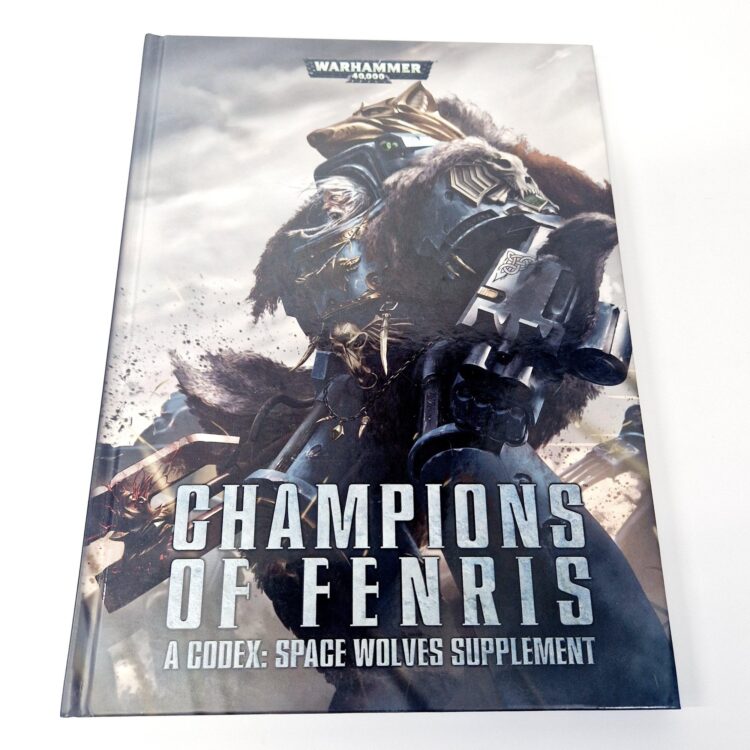 A photo of a Warhammer Champions of Fenris 7th Edition Space Wolves Codex