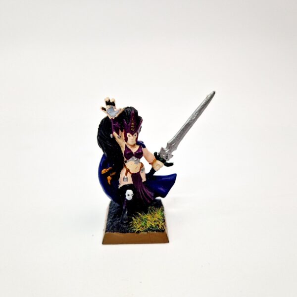 A photo of a Dark Elves Sorceress Talisman Dragon's Tower Warhammer miniature