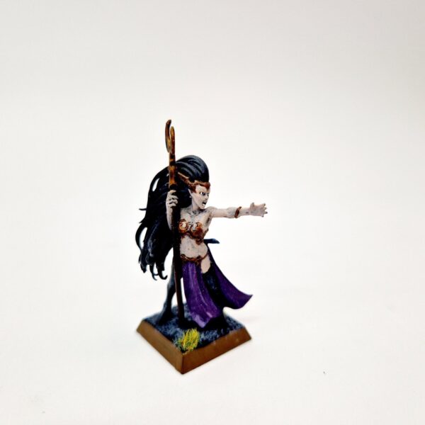 A photo of a Dark Elves Sorceress Warhammer miniature