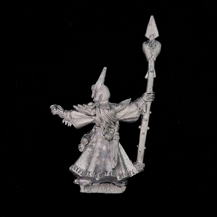 A photo of a Dark Elves Sorcerer Warhammer miniature