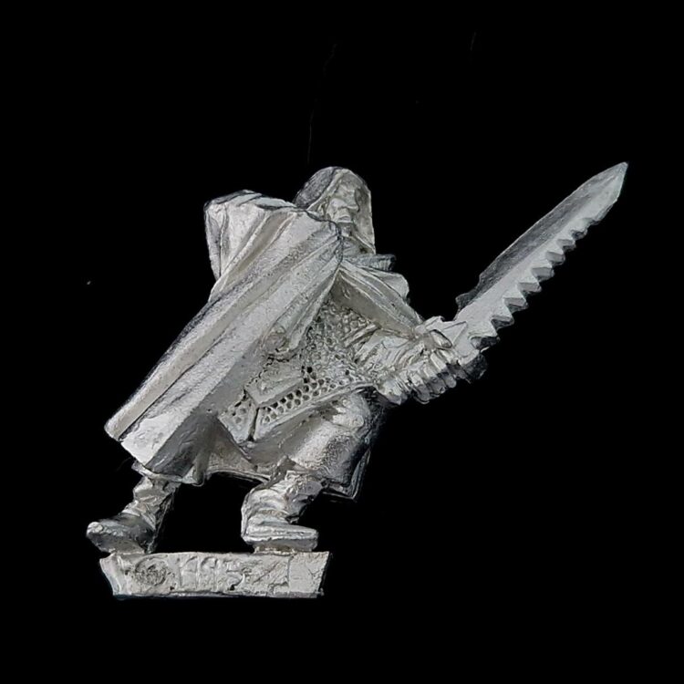 A photo of a Dark Elf Assassin Warhammer miniature