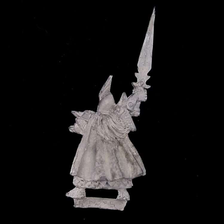 A photo of a Dark Elves Champion Warhammer miniature