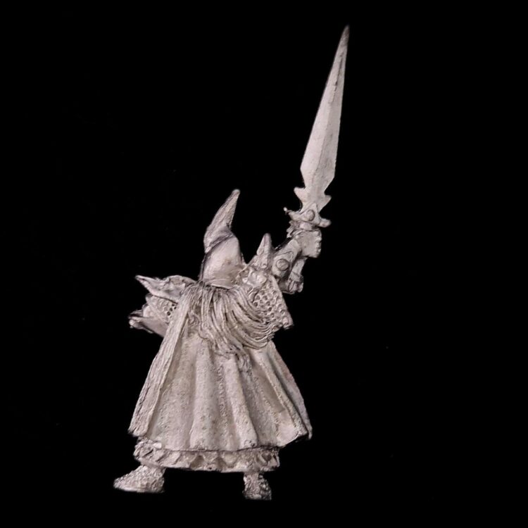 A photo of a Dark Elves Champion Warhammer miniature