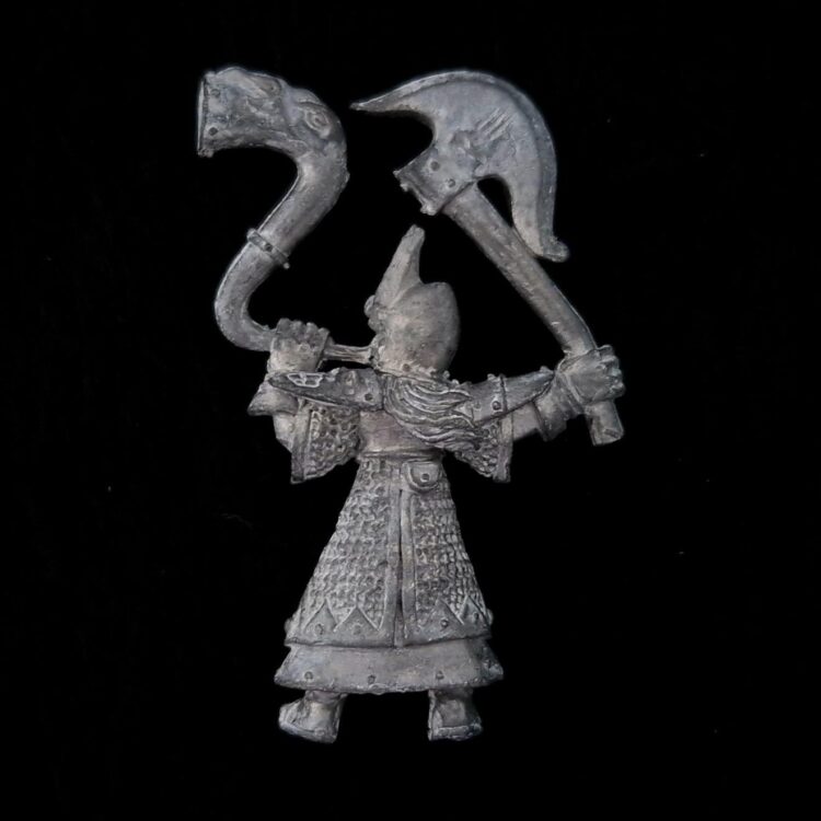 A photo of a Dark Elves Musician Warhammer miniature