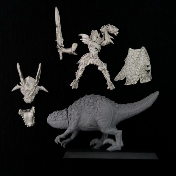 A photo of a Dark Elves Malus Darkblade on Cold One Warhammer miniature