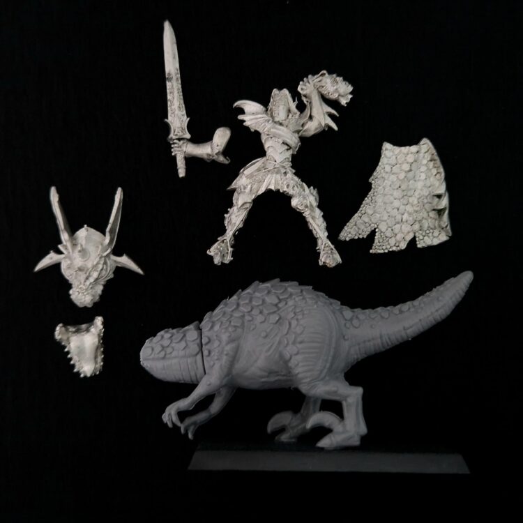 A photo of a Dark Elves Malus Darkblade on Cold One Warhammer miniature