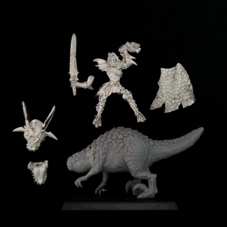A photo of a Dark Elves Malus Darkblade on Cold One Warhammer miniature