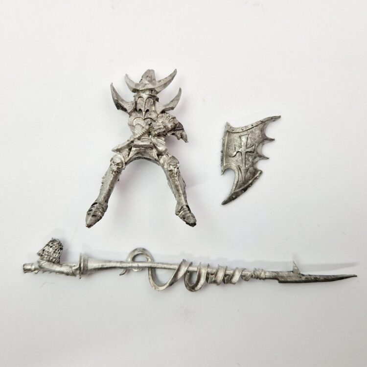 A photo of a Dark Elves Cold One Knight Warhammer miniature