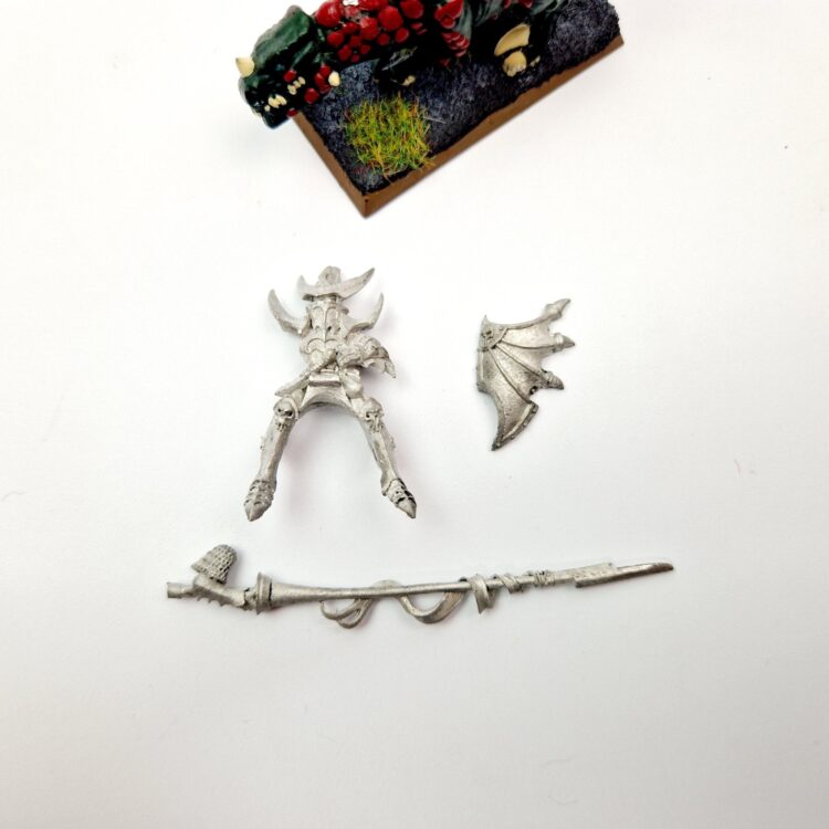 A photo of a Dark Elves Cold One Knight Warhammer miniature