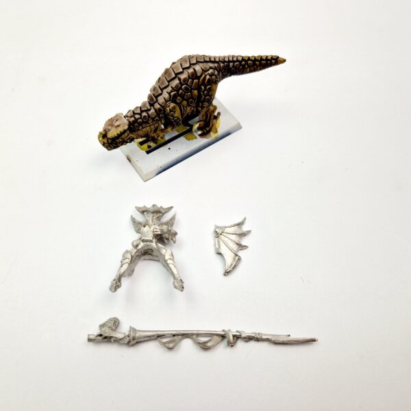 A photo of a Dark Elves Cold One Knight Warhammer miniature