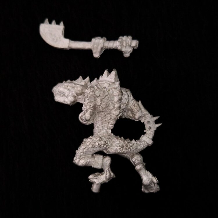 A photo of a Lizardmen Kroxigor Warhammer miniature