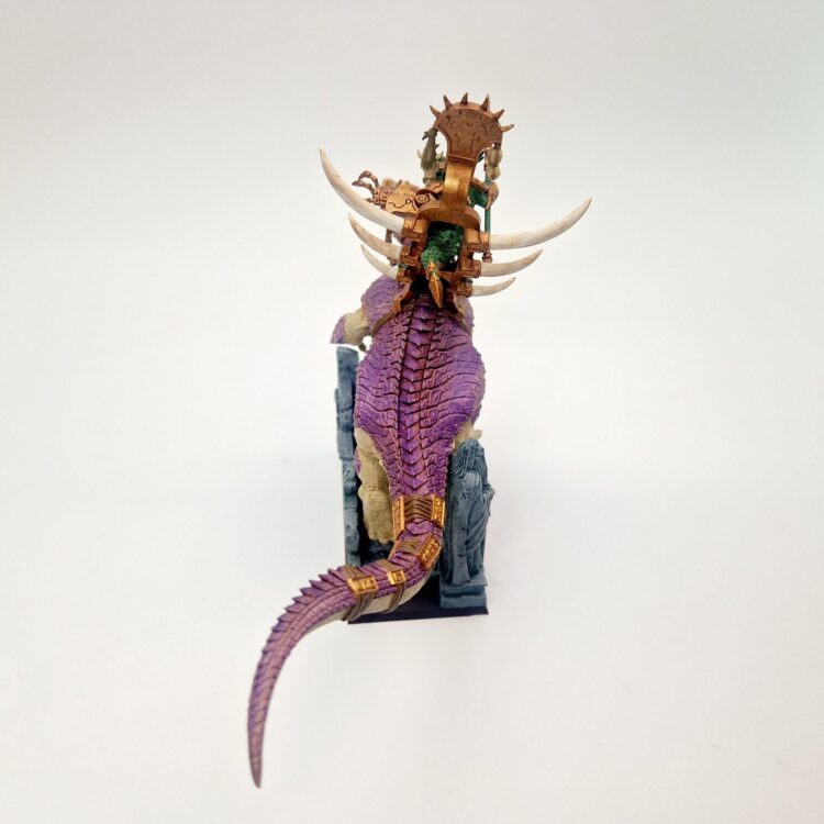 A photo of a Saurus Oldblood on Carnosaur Warhammer miniature