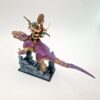 A photo of a Saurus Oldblood on Carnosaur Warhammer miniature