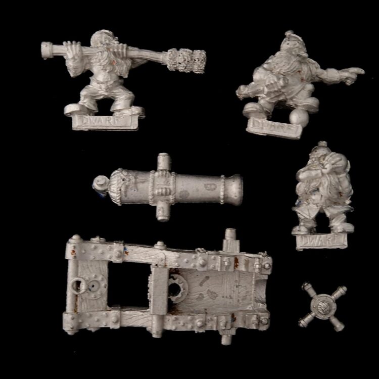 A photo of a Dwarf Cannon and Crew Warhammer miniature