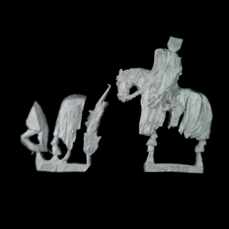 A photo of a Mordor Nazgûl The Tainted Mounted Middle Earth Warhammer miniature
