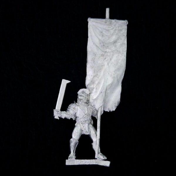 A photo of a Isengard Uruk-Hai Banner Bearer Middle Earth Warhammer miniature
