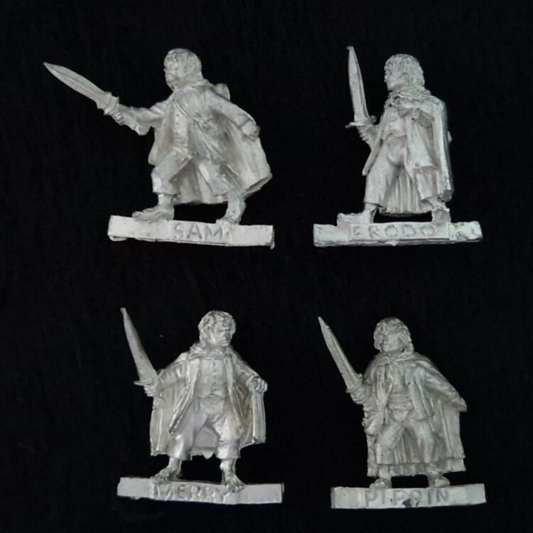 A photo of The Fellowship Frodo, Sam, Merry and Pippin Warhammer miniatures