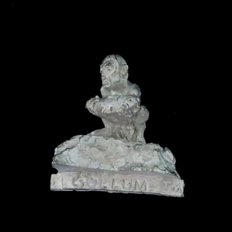 A photo of a The Fellowship Gollum Ithilien Middle Earth Warhammer miniature