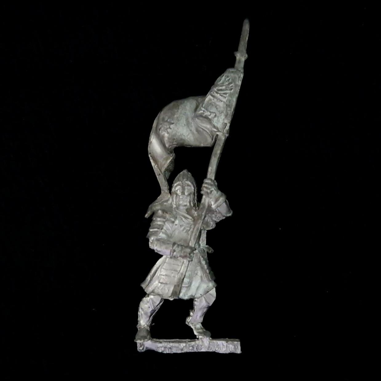 A photo of a Minas Tirith Banner Bearer Warhammer miniature