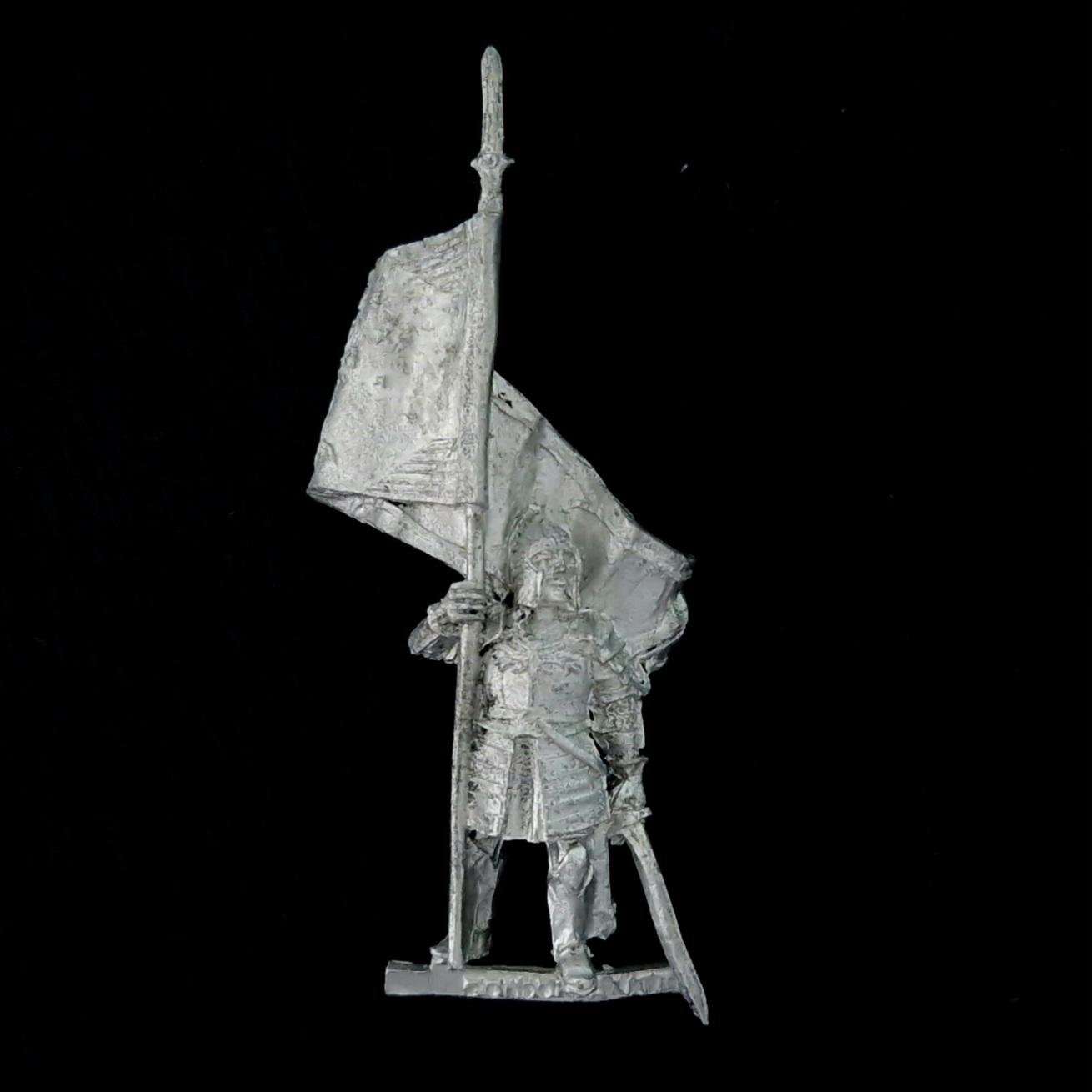 A photo of a Minas Tirith Banner Bearer Warhammer miniature