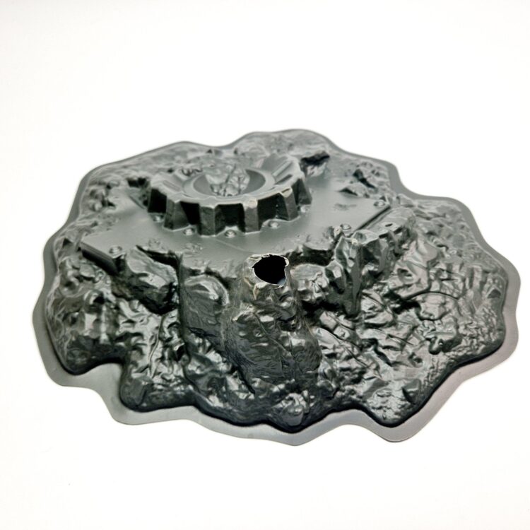 A photo of a Planetstrike Blastscape Crater Warhammer Scenery Terrain piece